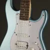 Squier Affinity Series™ Stratocaster® Junior HSS, Laurel Fingerboard, White Pickguard, Ice Blue Metallic – New