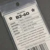 Token B2-60 Small Triangle (1.52 mm) Tan Pick